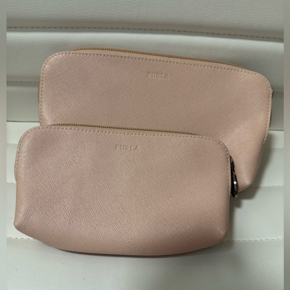 Furla signature zip top cosmetic case set (set of two). Baby pink.